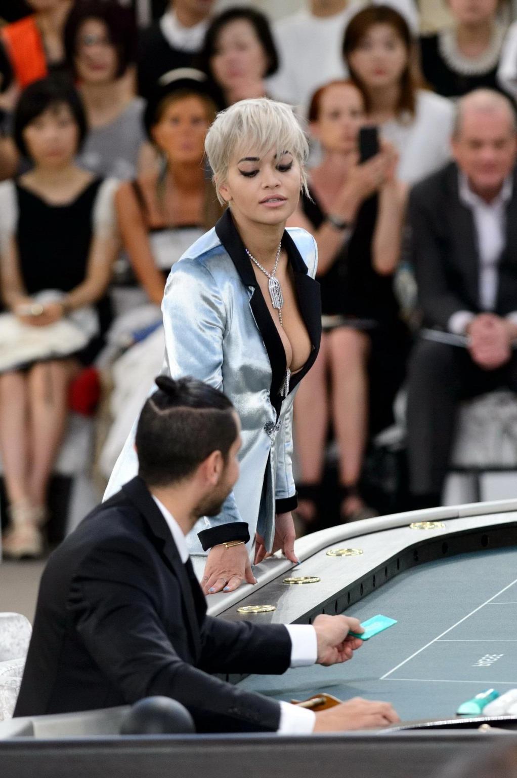 16P Rita Ora showing huge cleavage at the Chanel fashion show