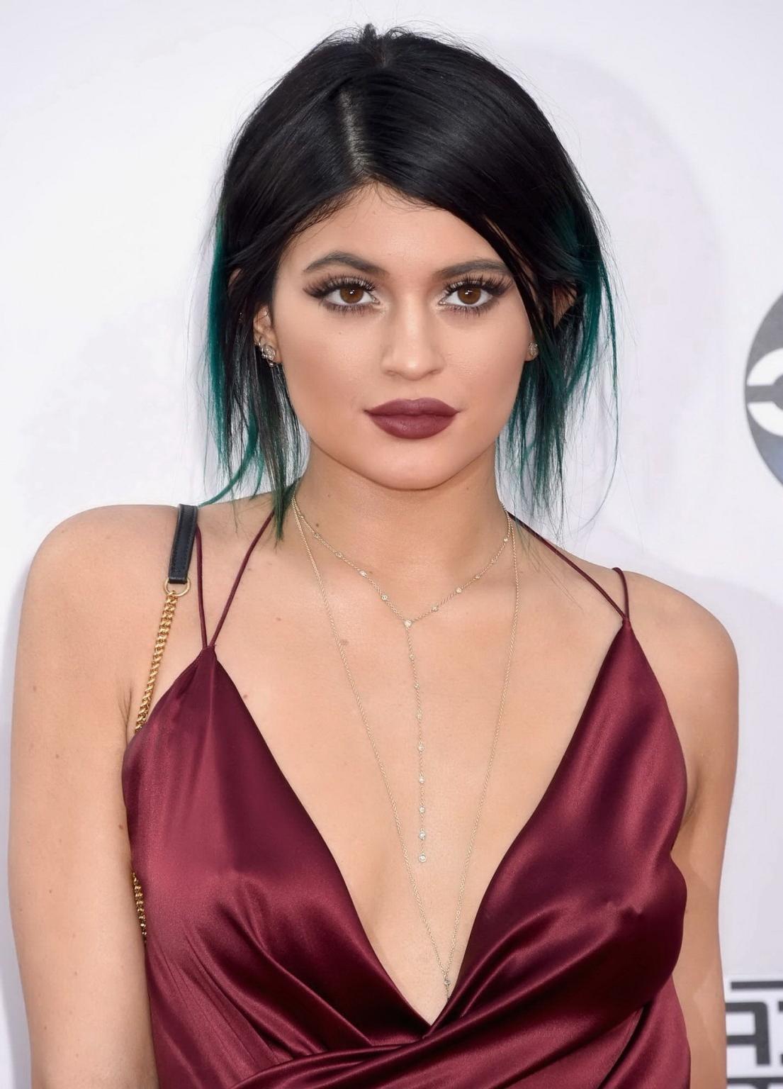 16P Kylie Jenner showing huge cleavage and leggy