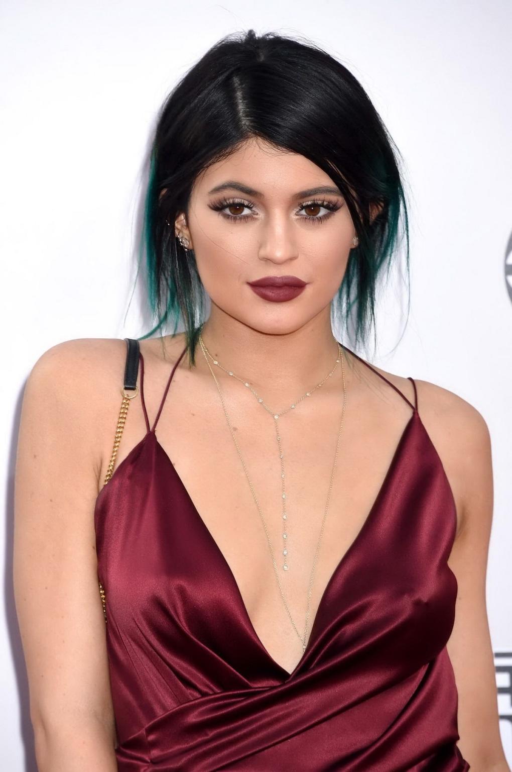 16P Kylie Jenner showing huge cleavage and leggy