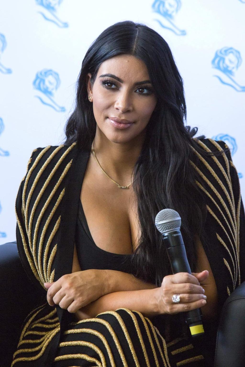 16P Kim Kardashian showing huge cleavage at the Cannes Lions event