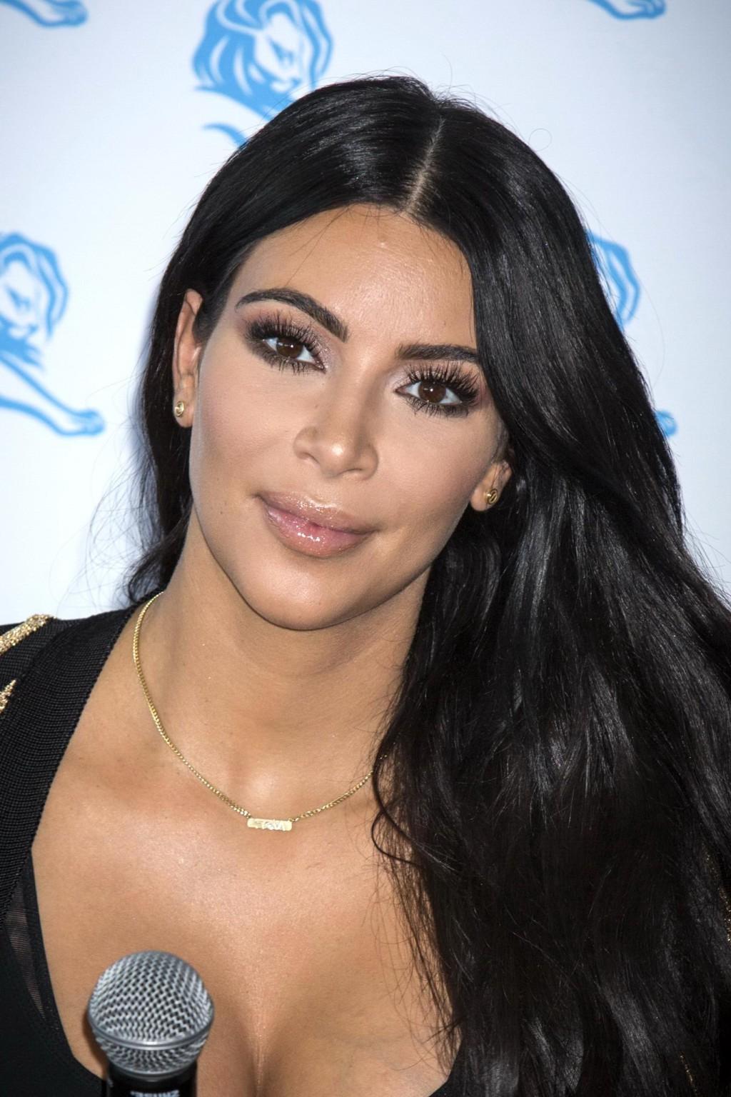 16P Kim Kardashian showing huge cleavage at the Cannes Lions event