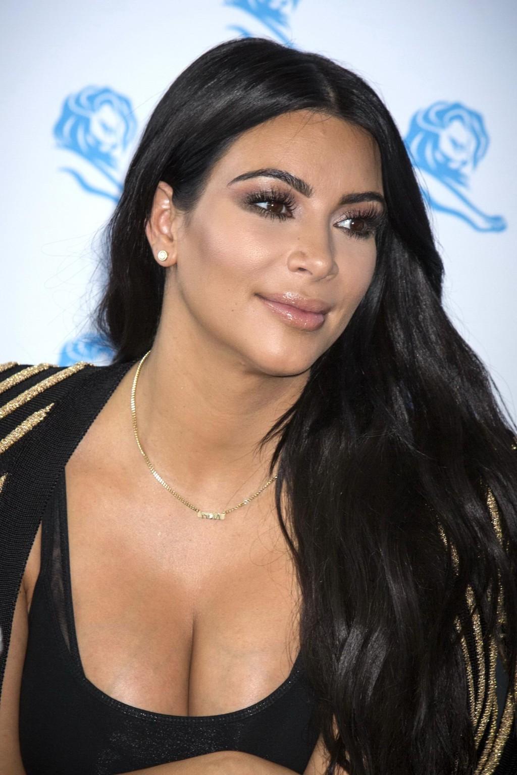 16P Kim Kardashian showing huge cleavage at the Cannes Lions event