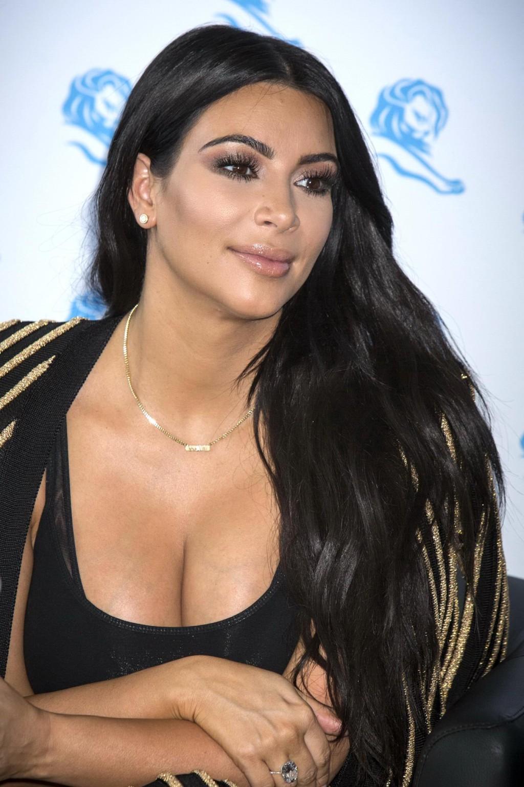 16P Kim Kardashian showing huge cleavage at the Cannes Lions event