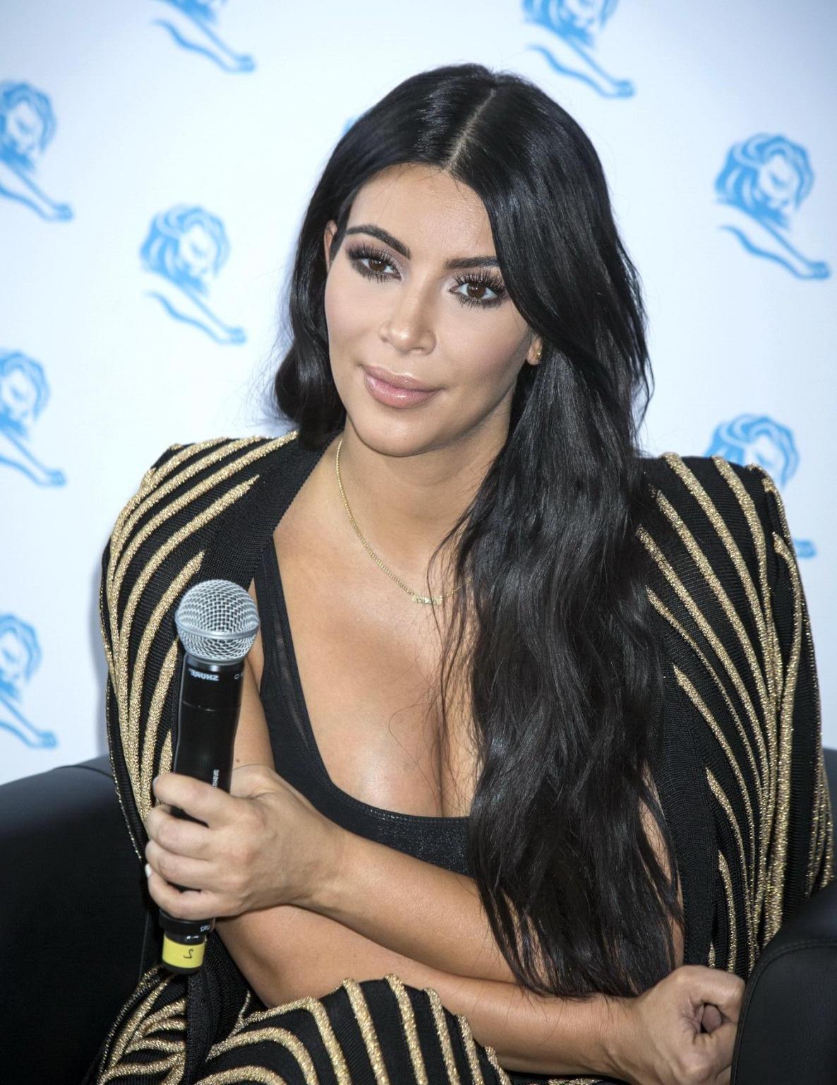 16P Kim Kardashian showing huge cleavage at the Cannes Lions event