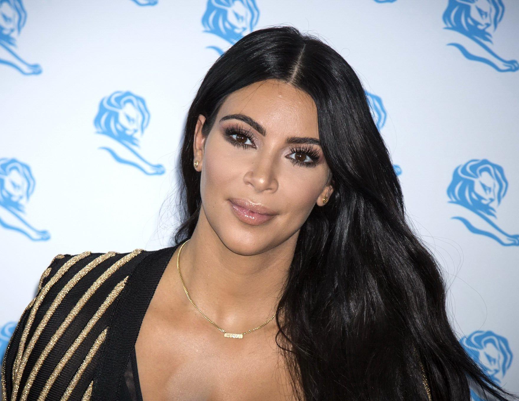 16P Kim Kardashian showing huge cleavage at the Cannes Lions event