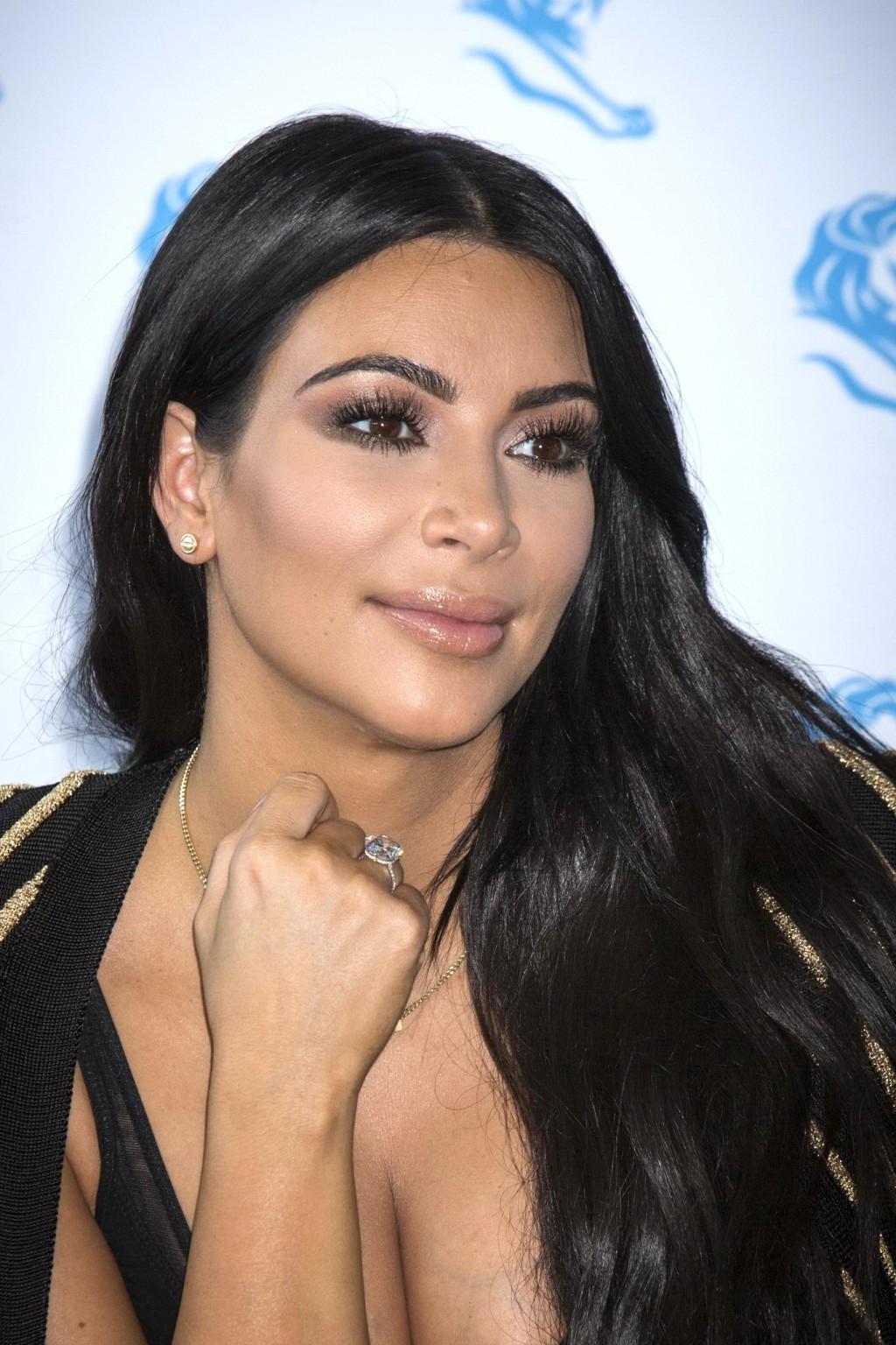 16P Kim Kardashian showing huge cleavage at the Cannes Lions event