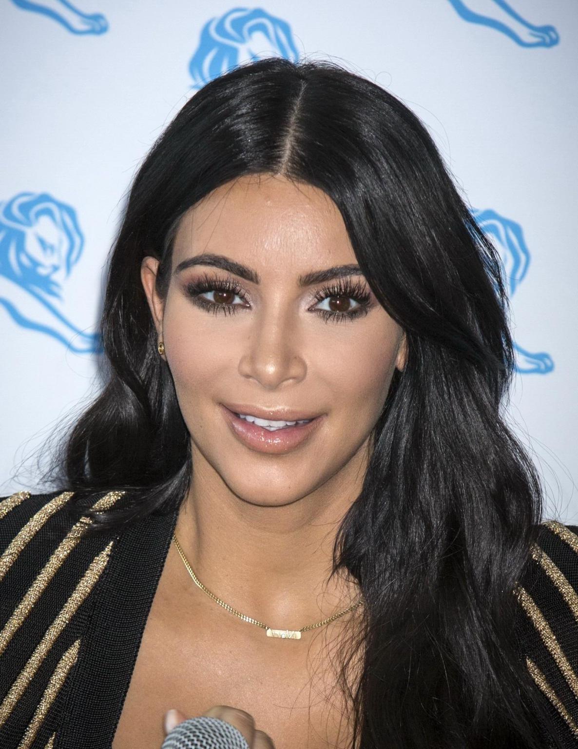 16P Kim Kardashian showing huge cleavage at the Cannes Lions event