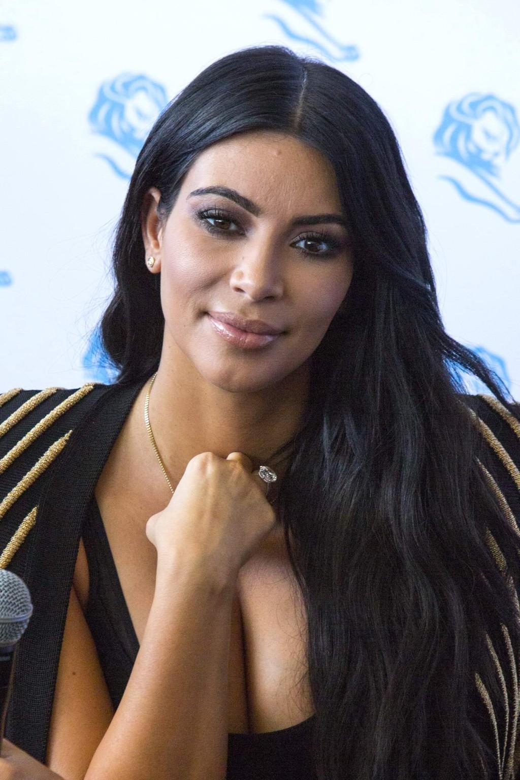 16P Kim Kardashian showing huge cleavage at the Cannes Lions event