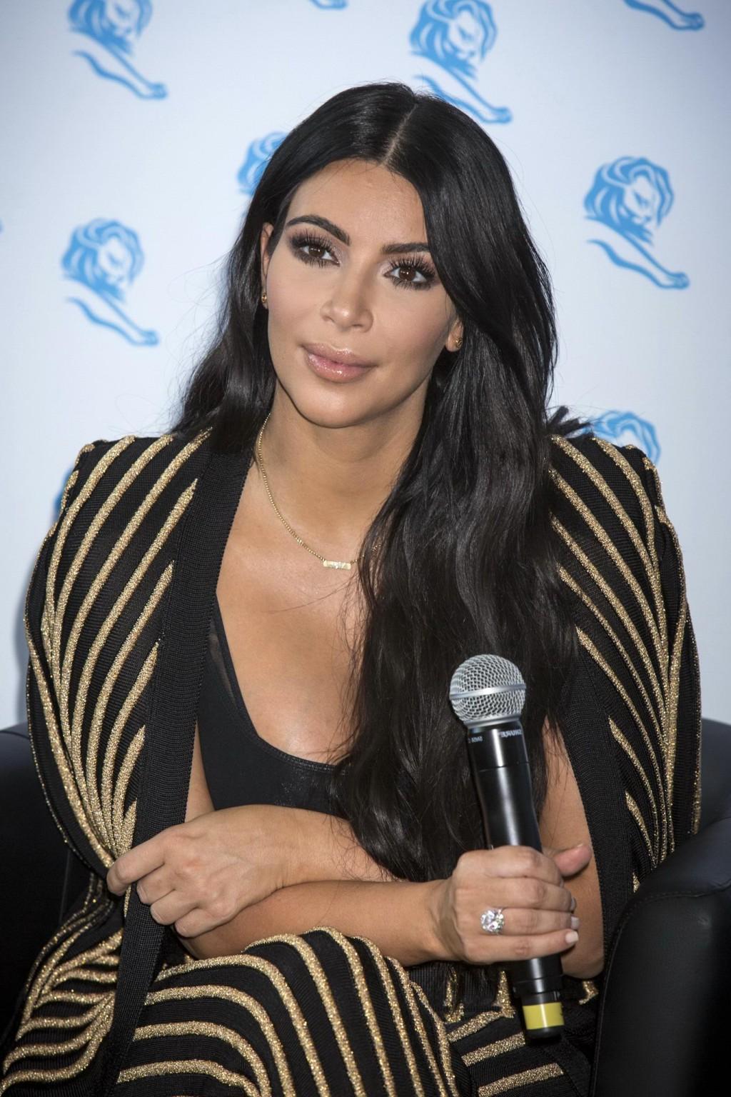 16P Kim Kardashian showing huge cleavage at the Cannes Lions event