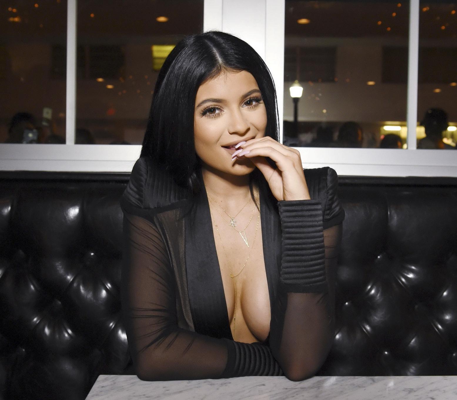 16P Kylie Jenner showing huge cleavage at the Sugar Factory Opening