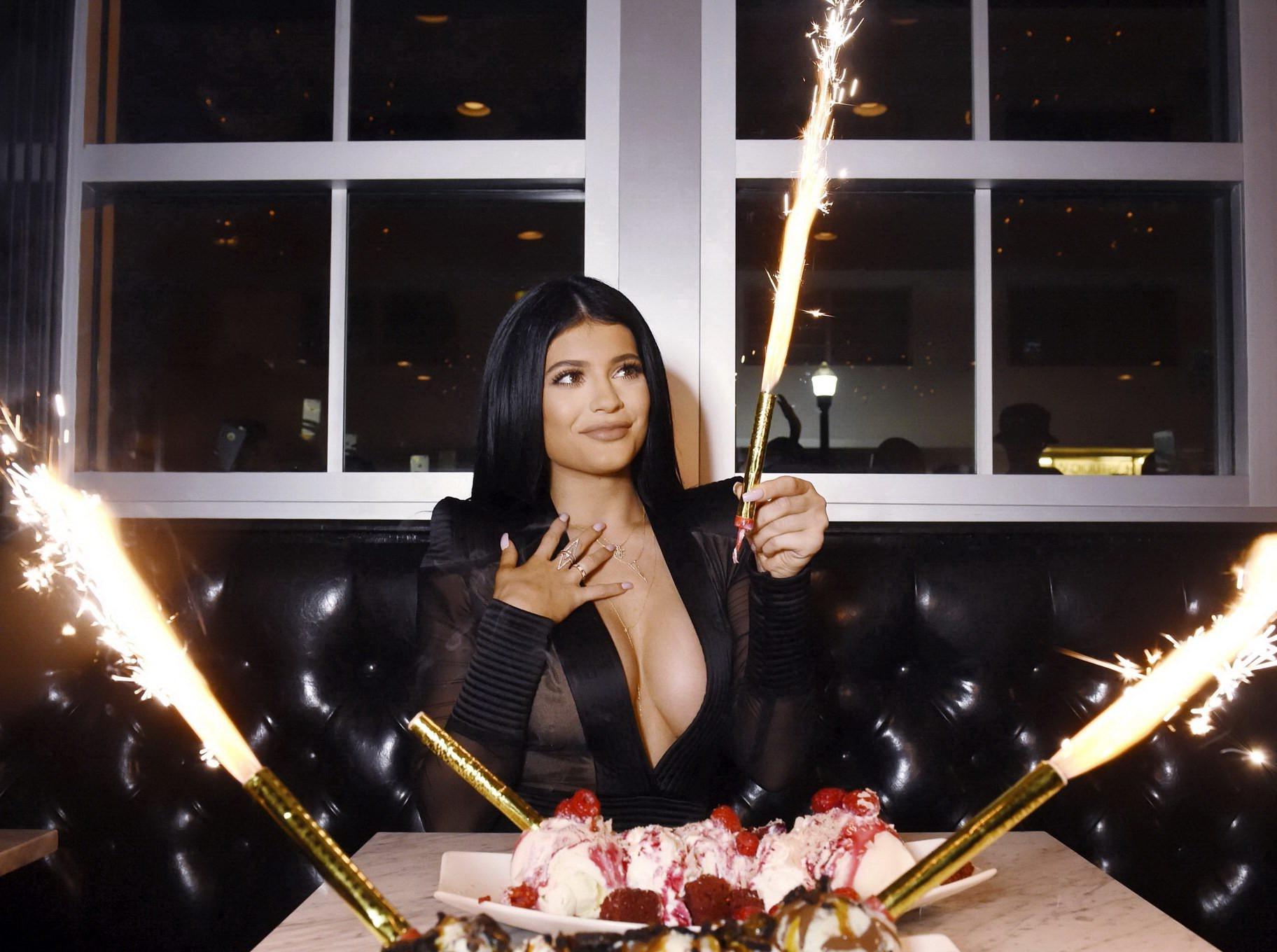 16P Kylie Jenner showing huge cleavage at the Sugar Factory Opening