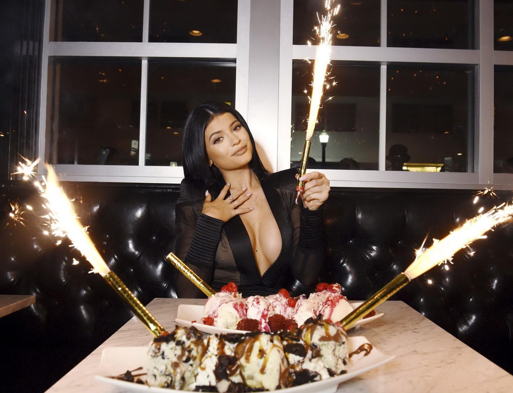 16P Kylie Jenner showing huge cleavage at the Sugar Factory Opening