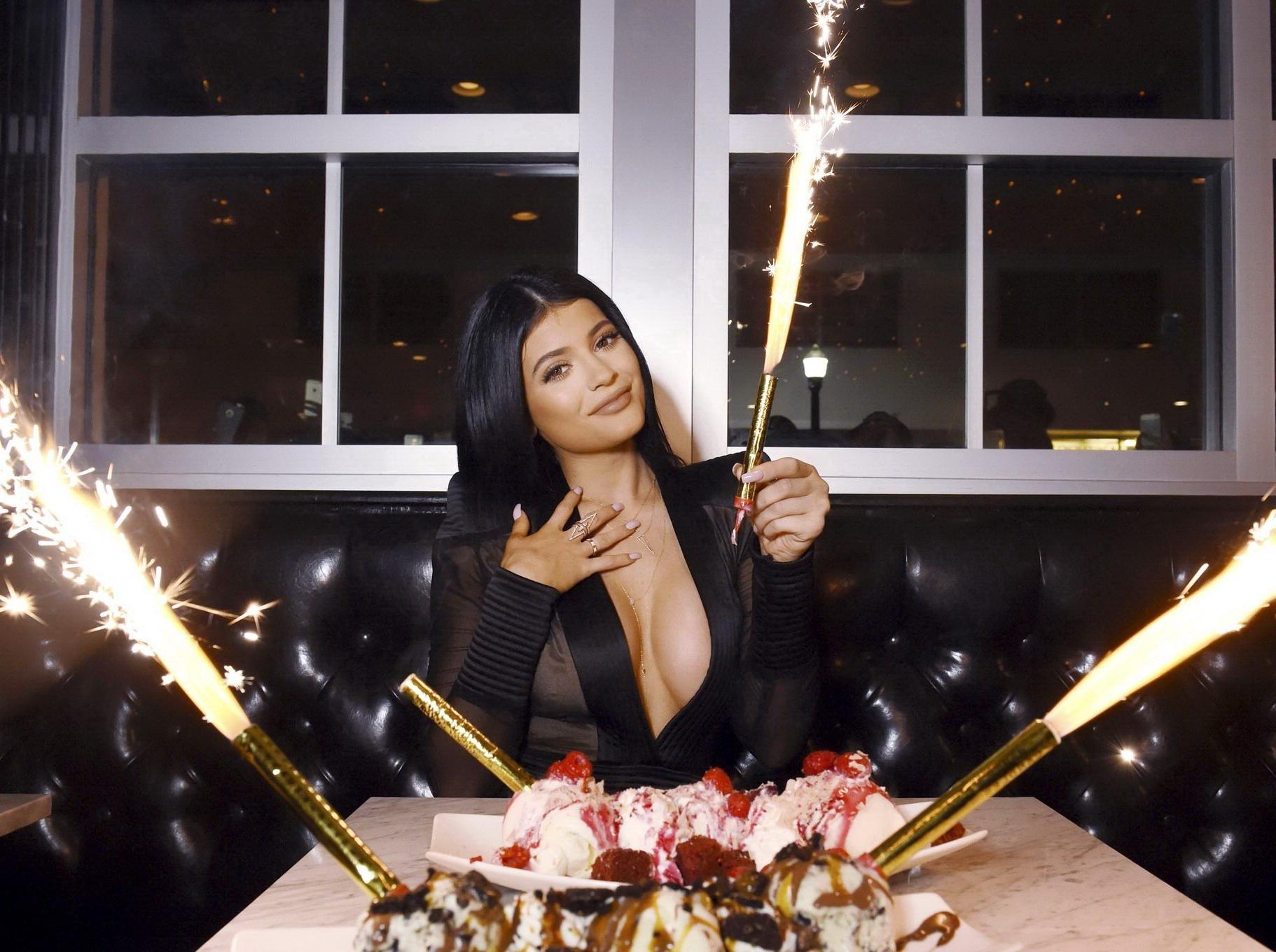 16P Kylie Jenner showing huge cleavage at the Sugar Factory Opening