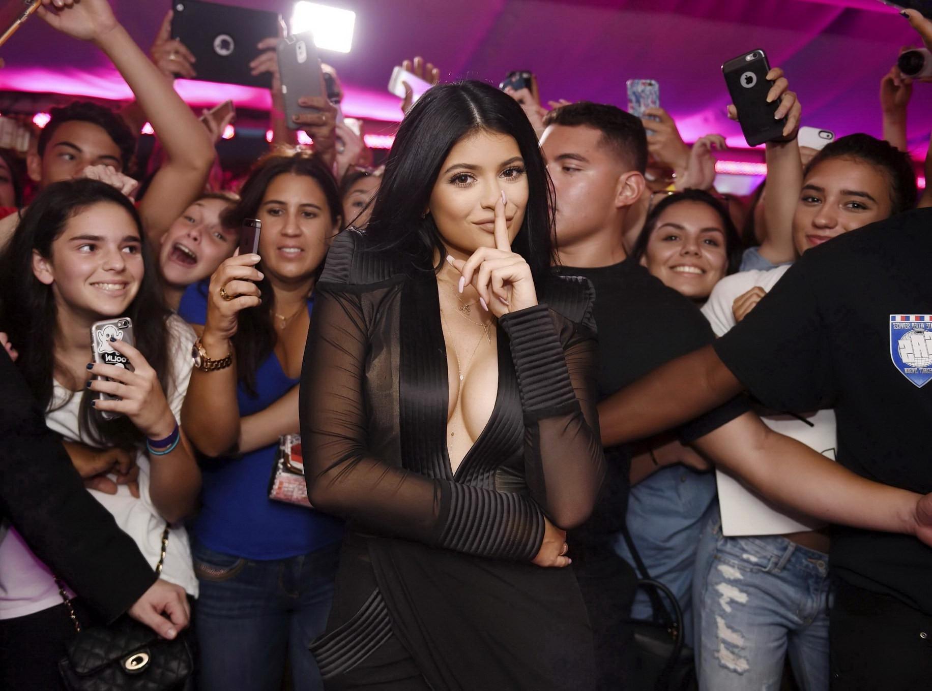 16P Kylie Jenner showing huge cleavage at the Sugar Factory Opening