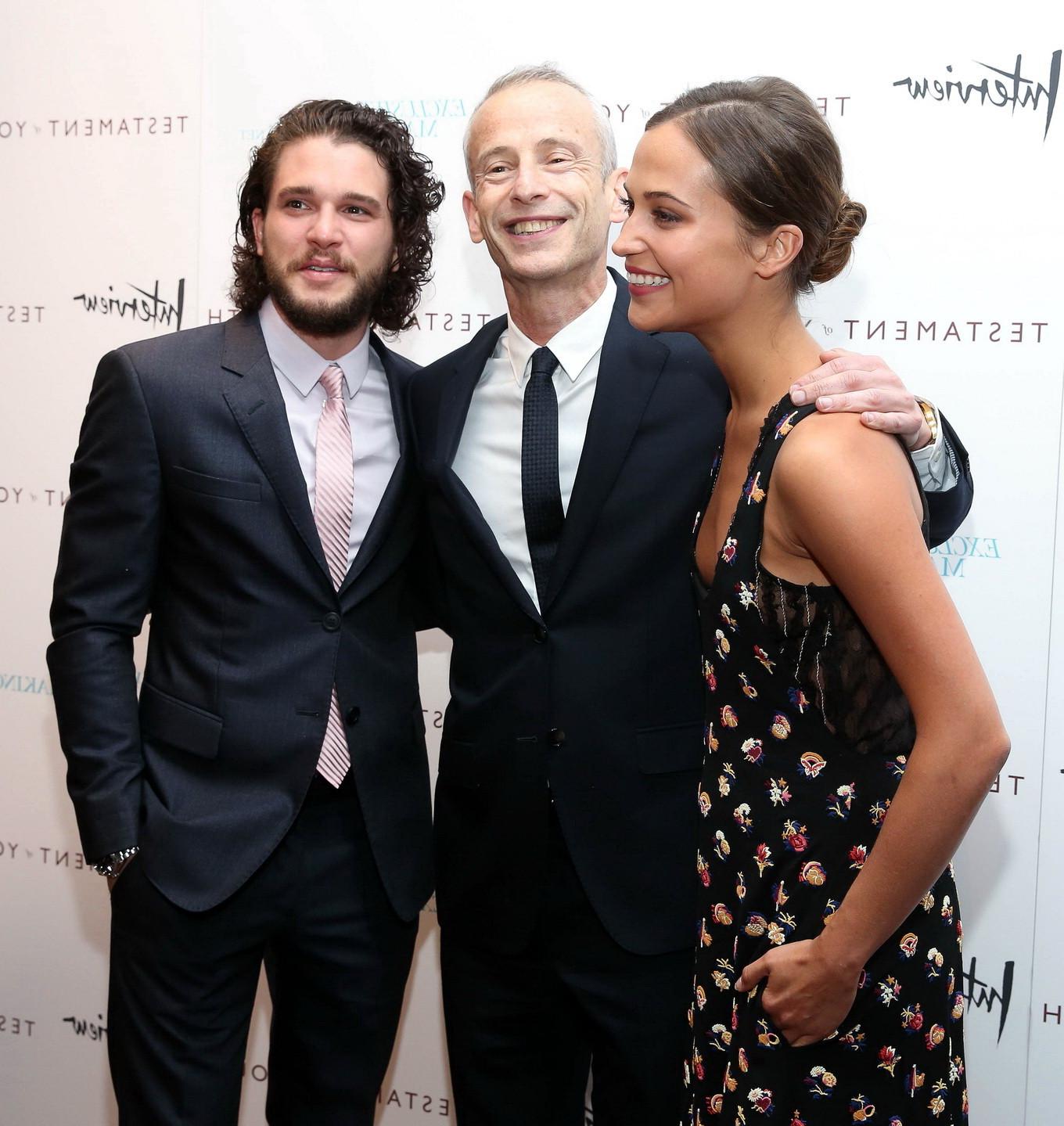 16P Alicia Vikander shows cleavage  side boob attending the Testament of Youth premi