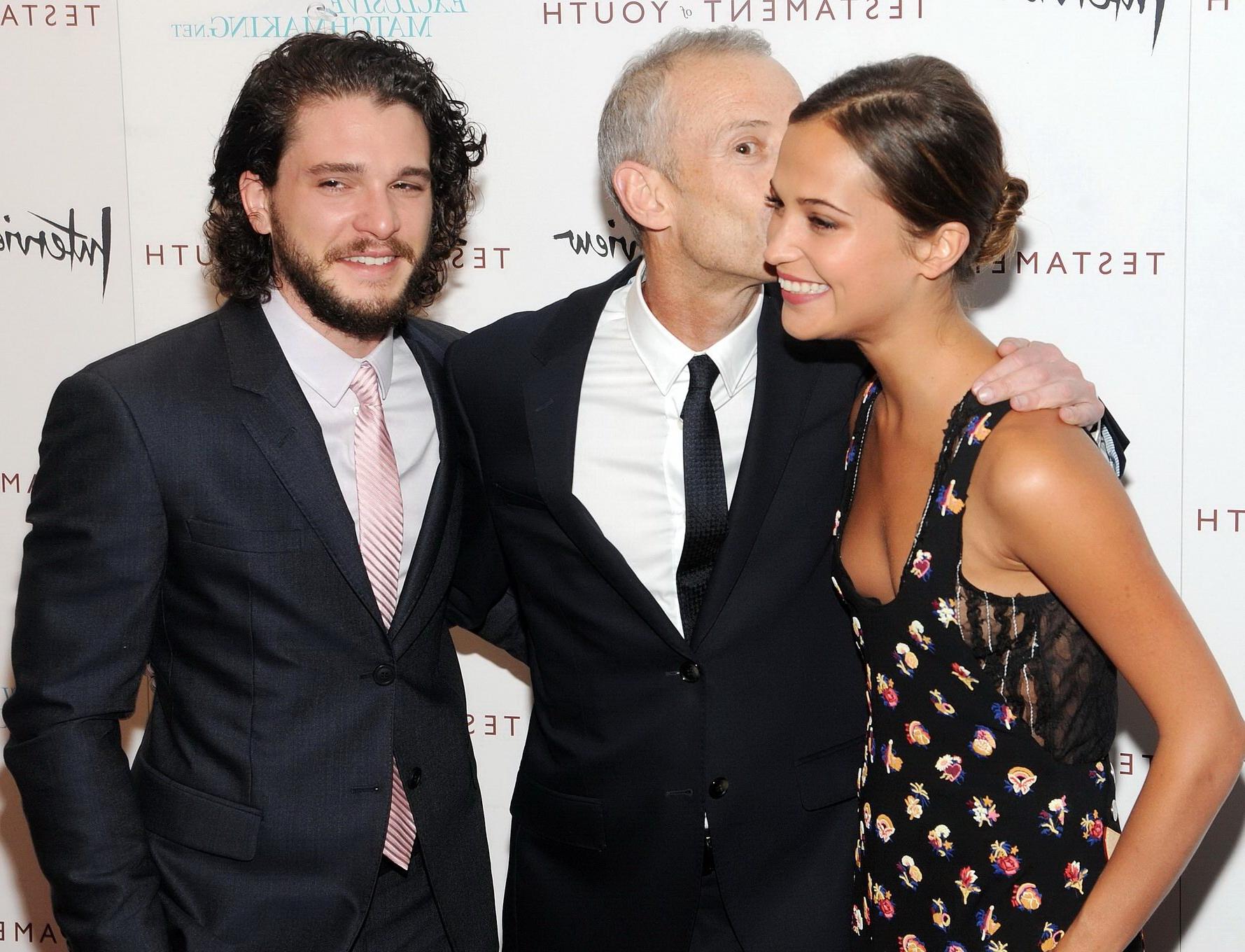 16P Alicia Vikander shows cleavage  side boob attending the Testament of Youth premi