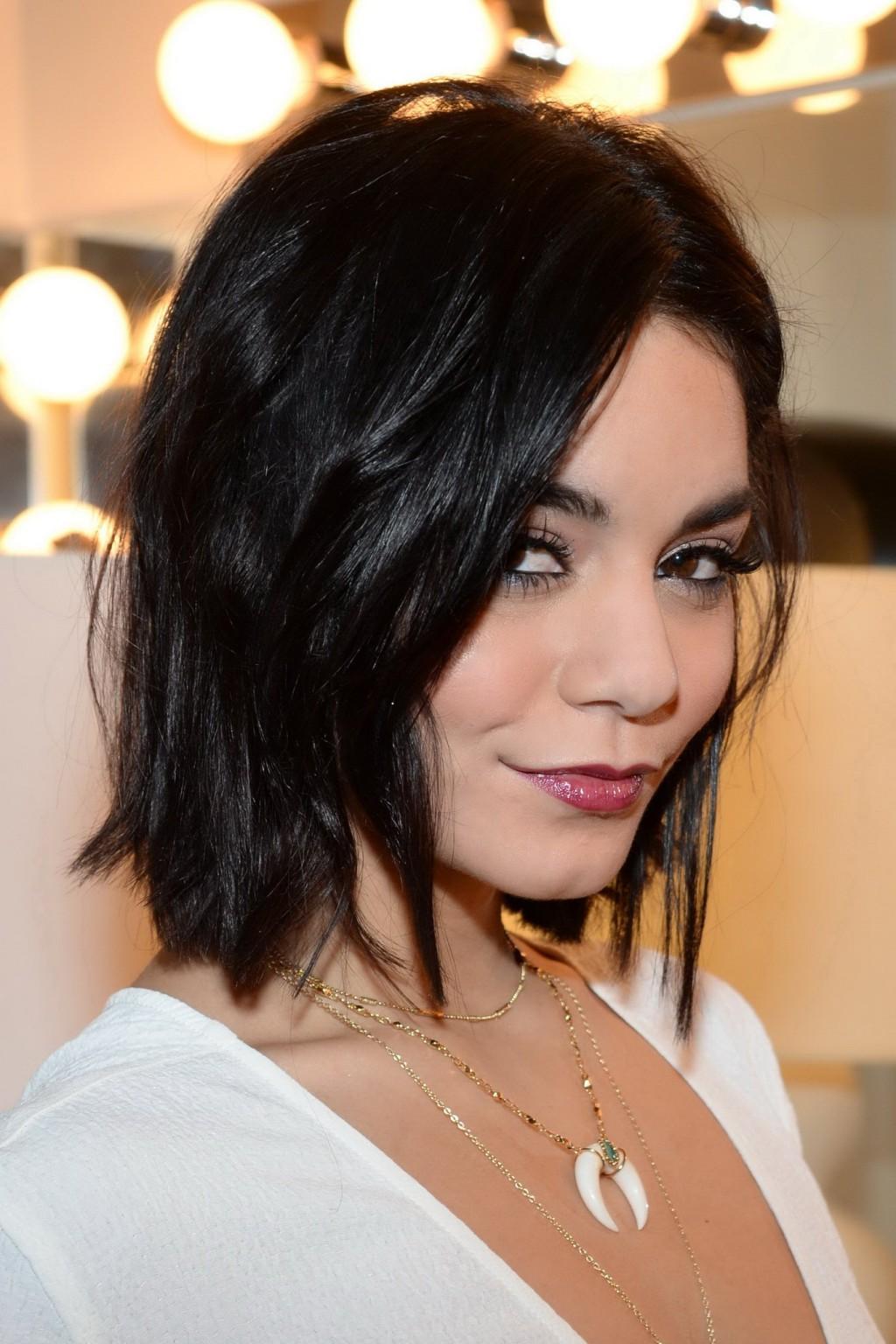 16P Vanessa Hudgens braless showing huge cleavage in white backless jumpsuit at back