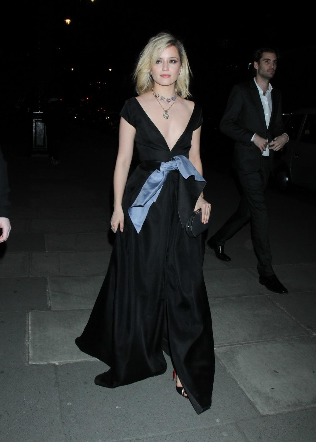 16P Dianna Agron nipple slip in a low cut black dress while arriving at Alexander Mc