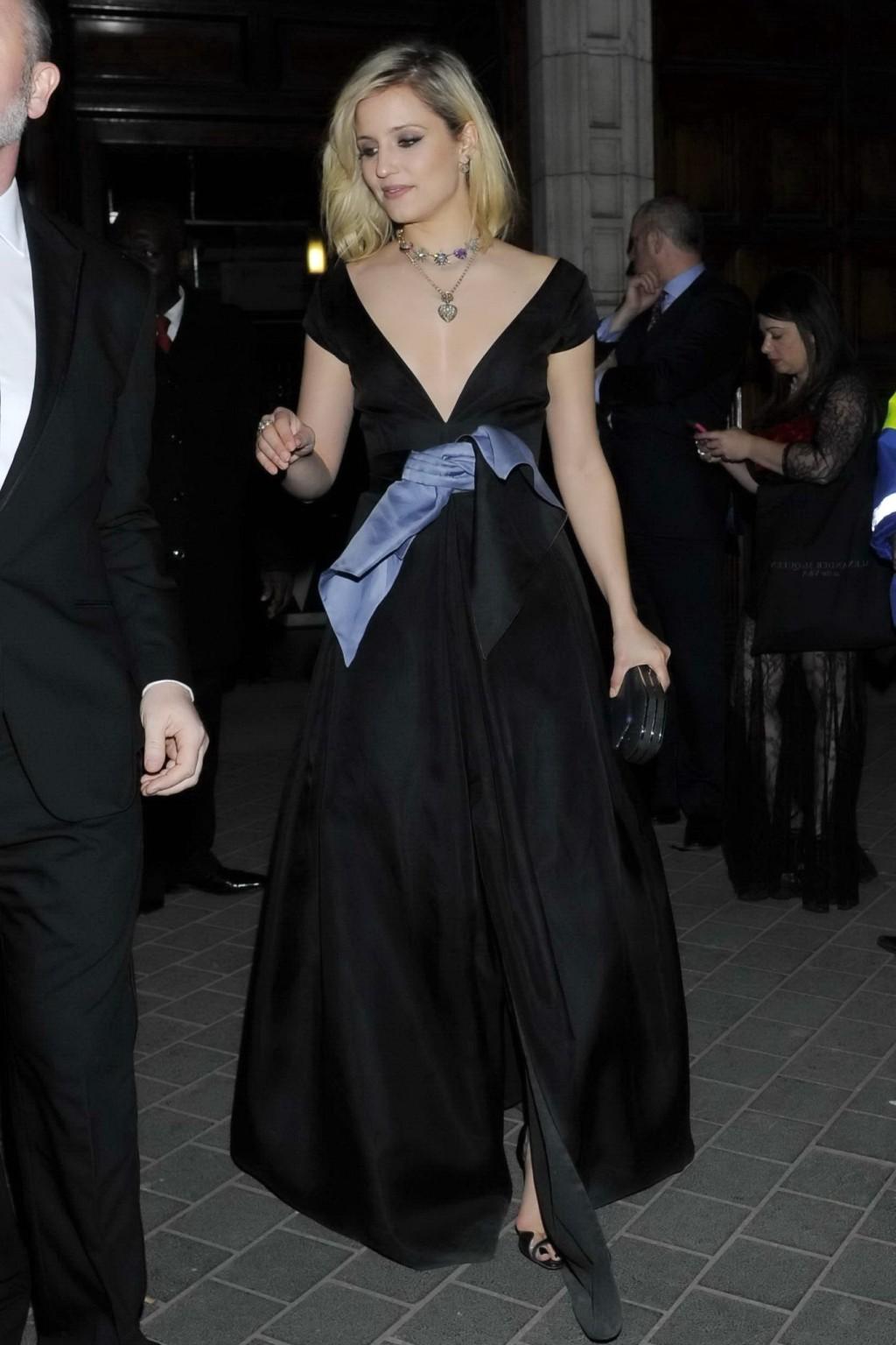 16P Dianna Agron nipple slip in a low cut black dress while arriving at Alexander Mc