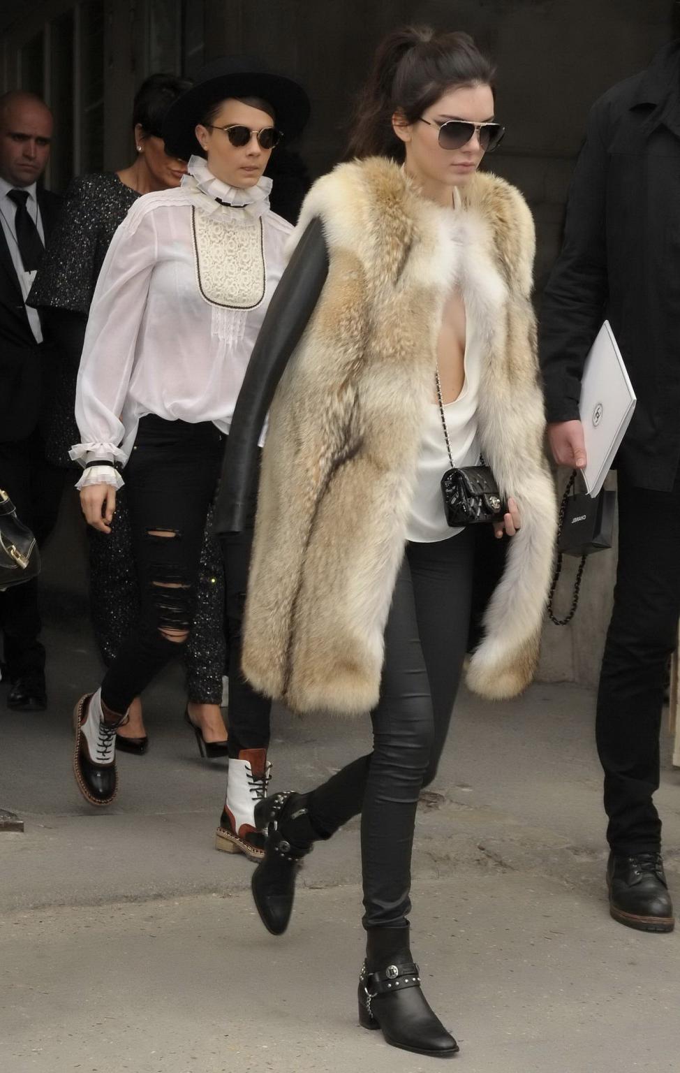 16P Kendall Jenner braless shows huge cleavage while leaving the Chanel Fashion Show