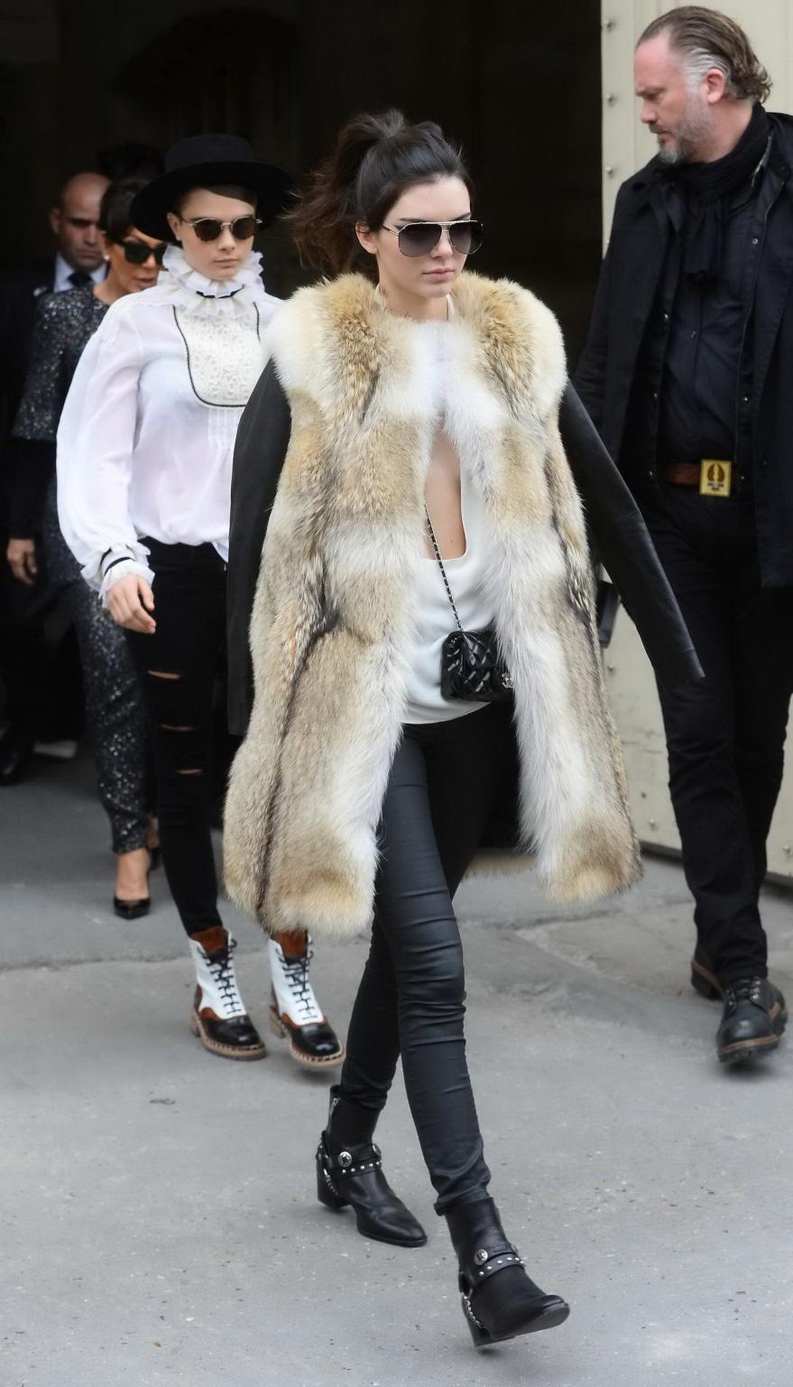 16P Kendall Jenner braless shows huge cleavage while leaving the Chanel Fashion Show