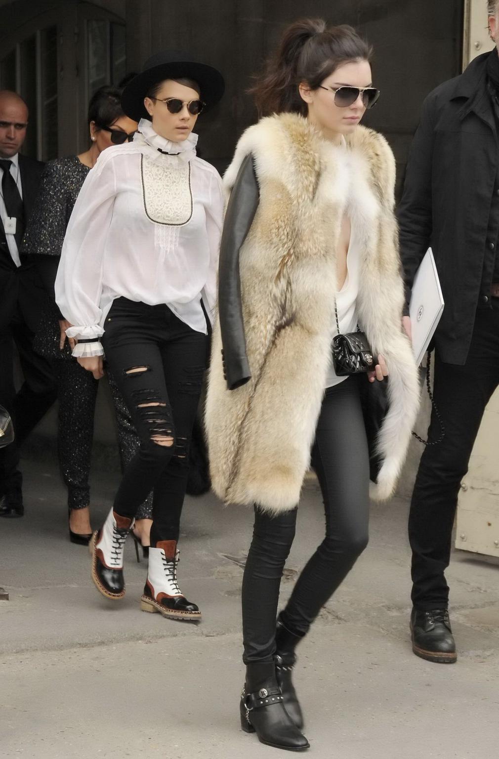 16P Kendall Jenner braless shows huge cleavage while leaving the Chanel Fashion Show