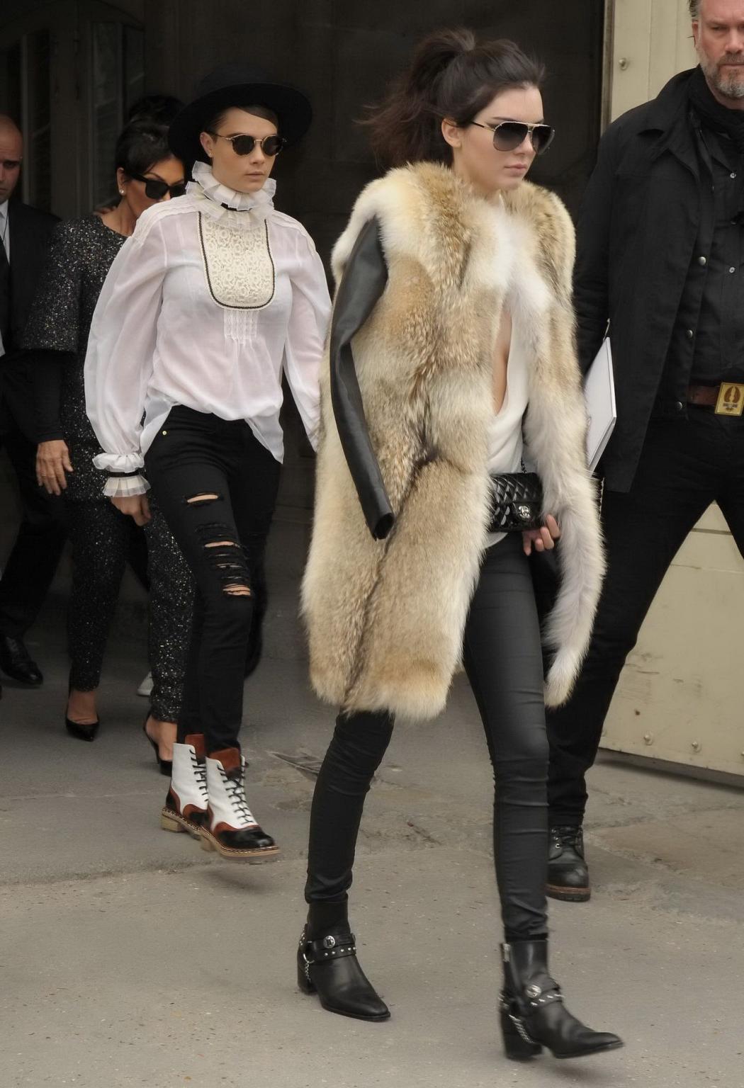 16P Kendall Jenner braless shows huge cleavage while leaving the Chanel Fashion Show