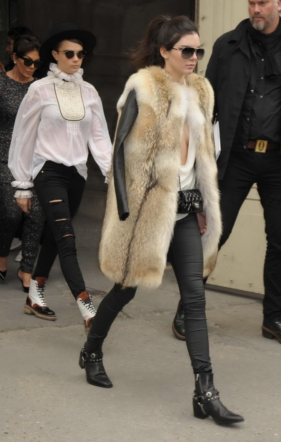 16P Kendall Jenner braless shows huge cleavage while leaving the Chanel Fashion Show