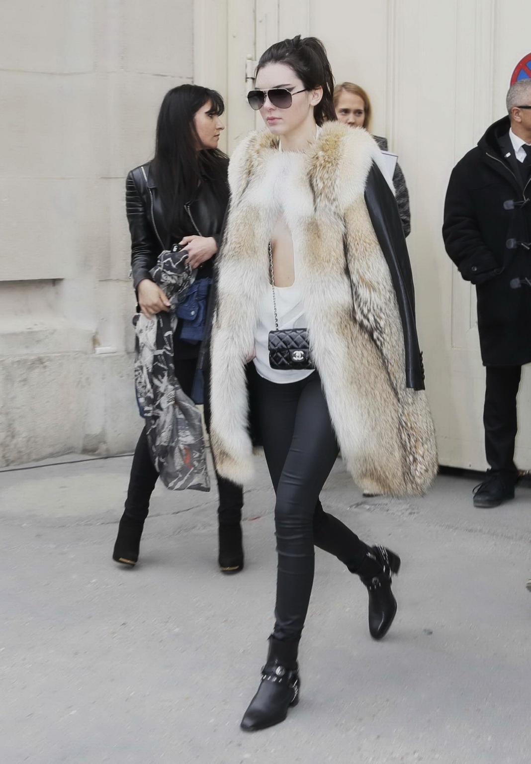 16P Kendall Jenner braless shows huge cleavage while leaving the Chanel Fashion Show