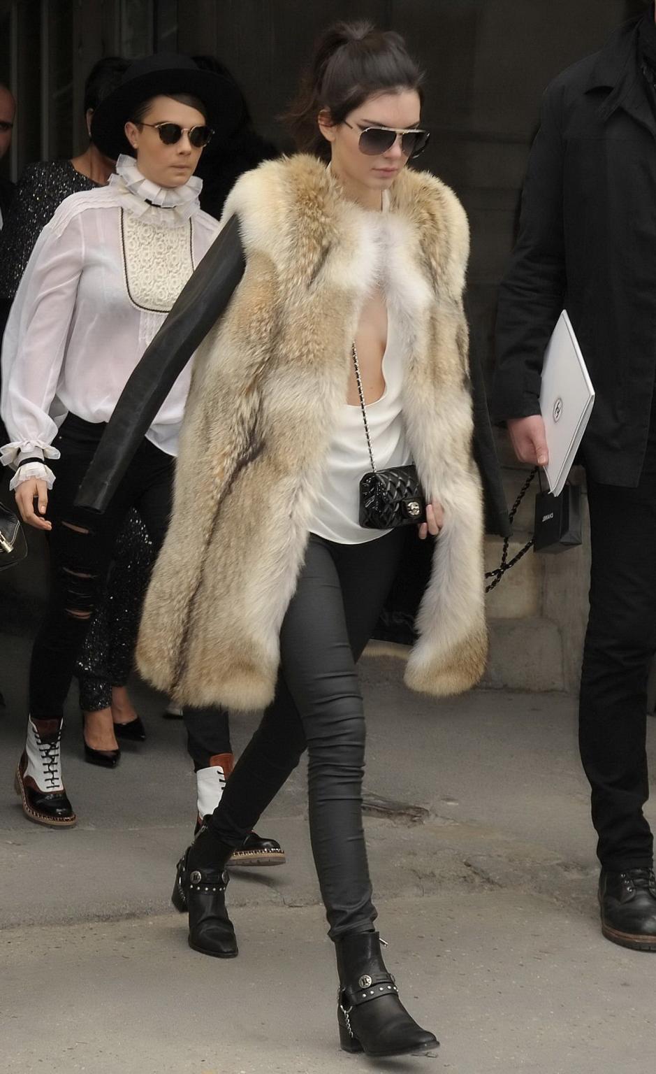 16P Kendall Jenner braless shows huge cleavage while leaving the Chanel Fashion Show