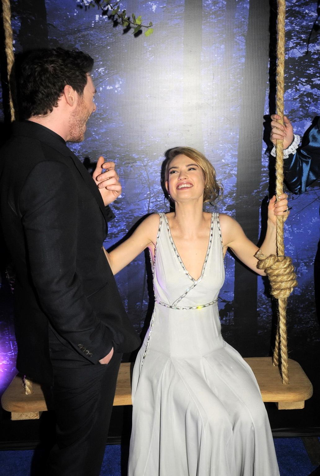 16P Lily James braless showing cleavage at the Cinderella premiere in Mexico City