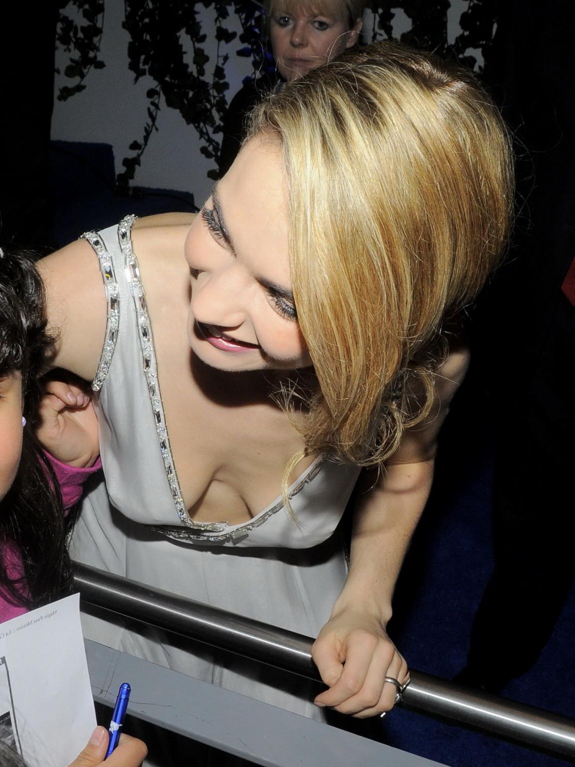 16P Lily James braless showing cleavage at the Cinderella premiere in Mexico City