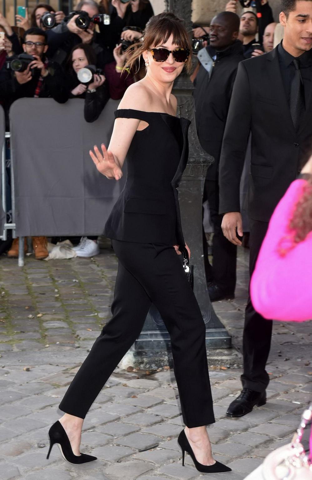 16P Dakota Johnson showing big cleavage in black jumpsuit at Christian Dior Fashion 