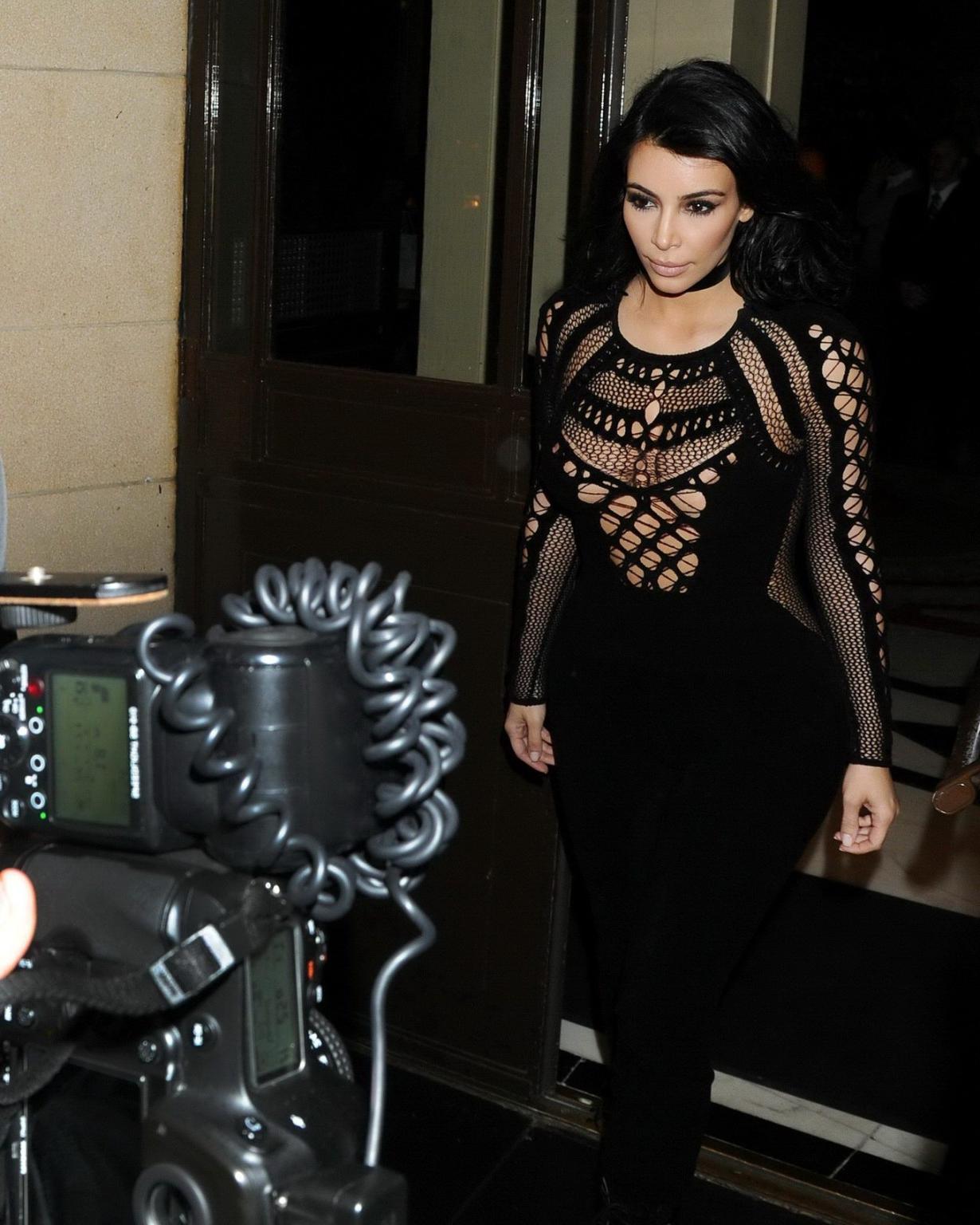 16P Kim Kardashian nip slip wearing a mesh jumpsuit at the BRIT Awards Arrivals and 