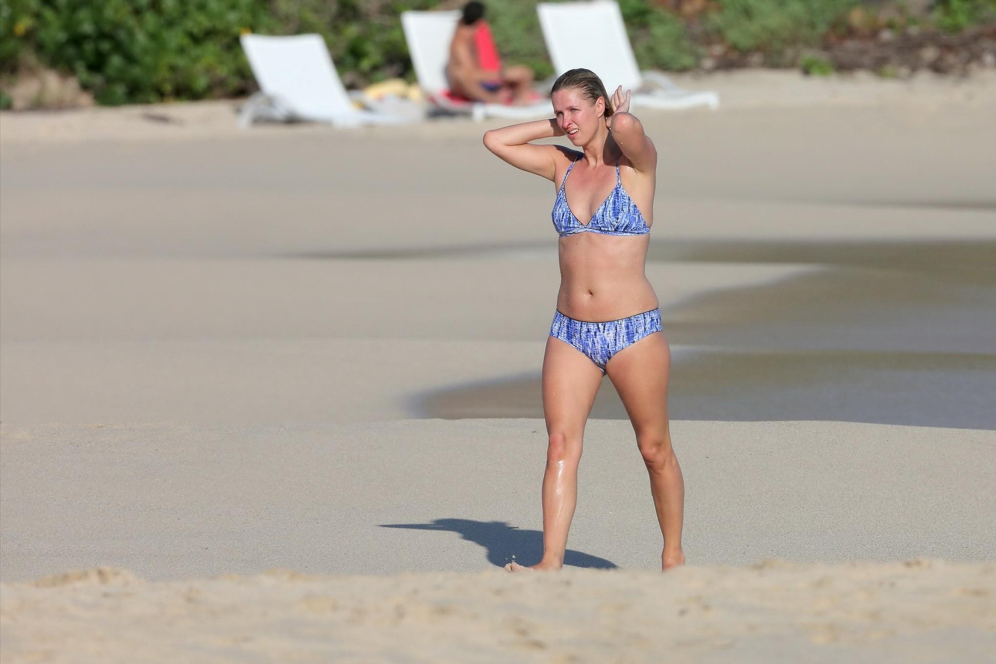 16P Nicky Hilton booty wearing blue retro bikini at some Caribbean beach