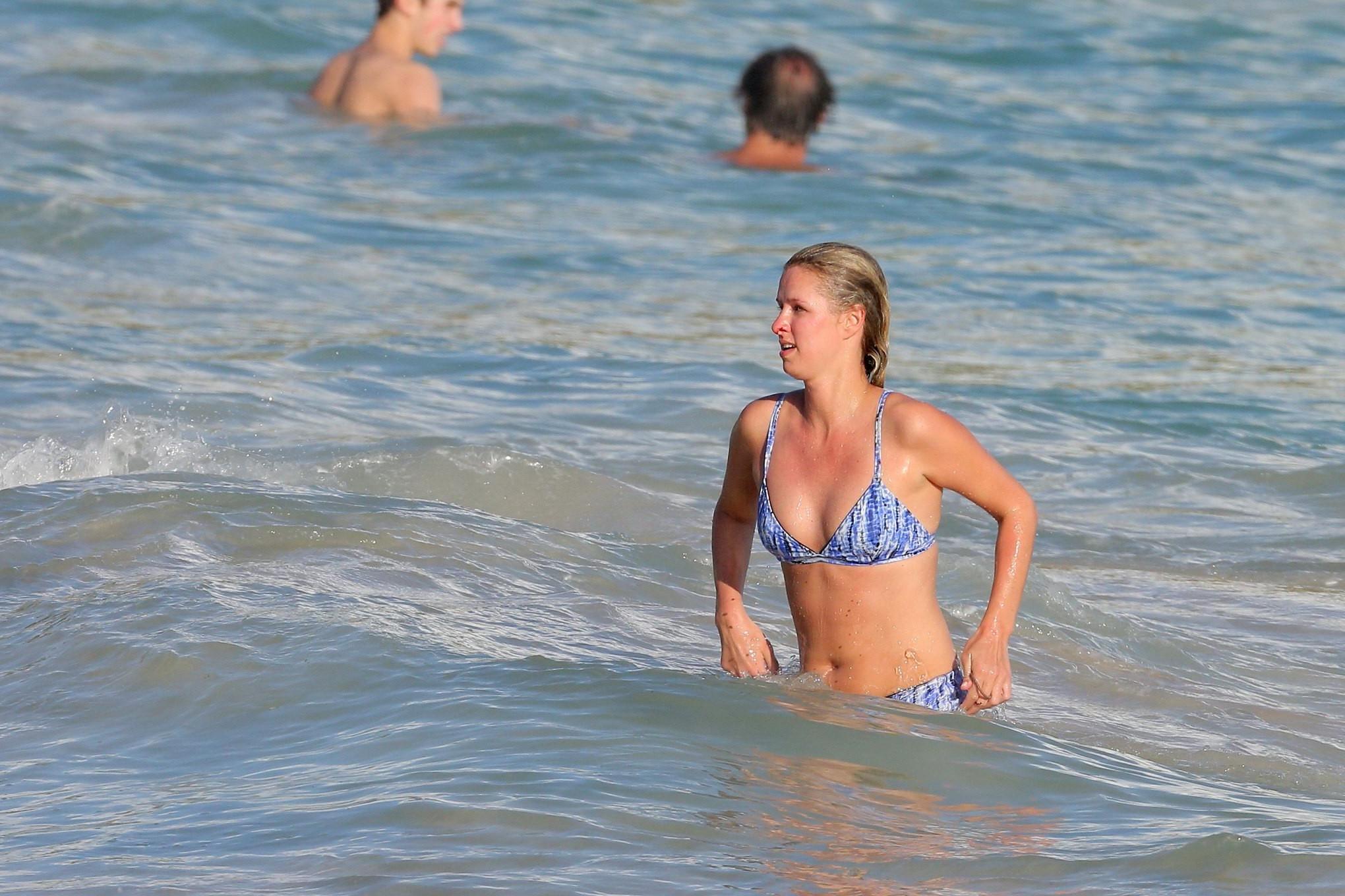 16P Nicky Hilton booty wearing blue retro bikini at some Caribbean beach