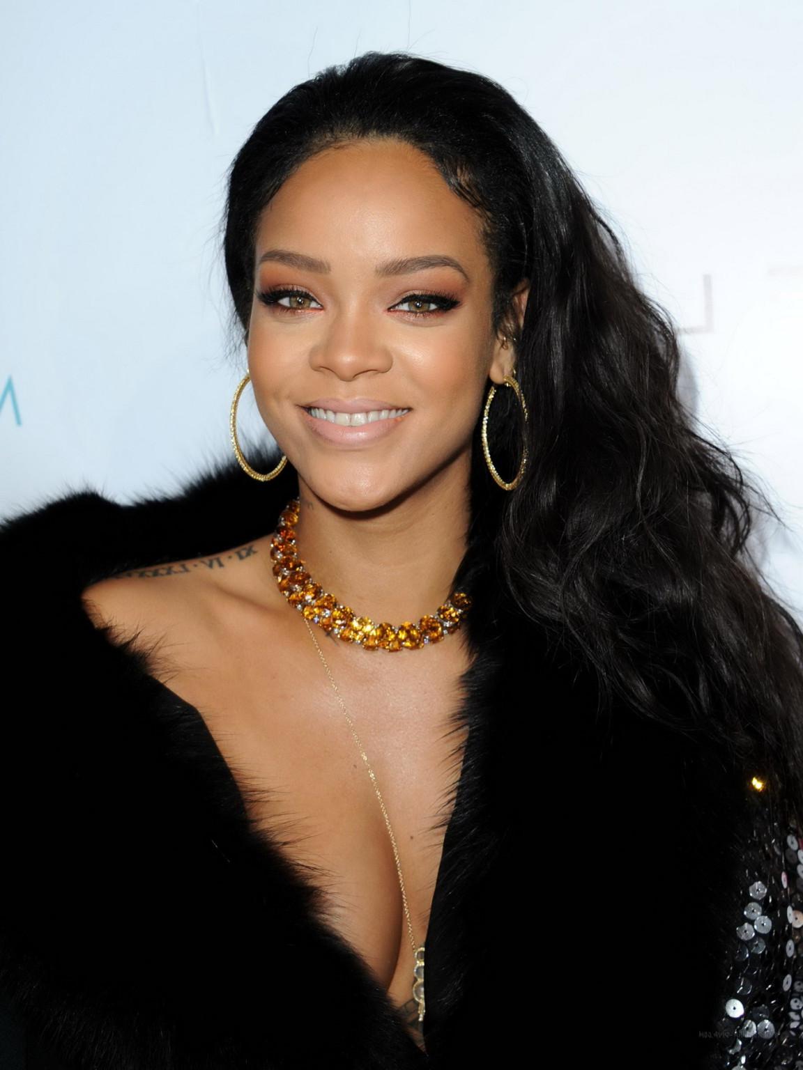 16P Rihanna showing cleavage at The DAILY FRONT ROW Fashion Los Angeles Awards Show 