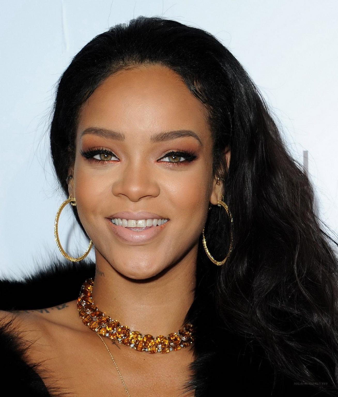 16P Rihanna showing cleavage at The DAILY FRONT ROW Fashion Los Angeles Awards Show 