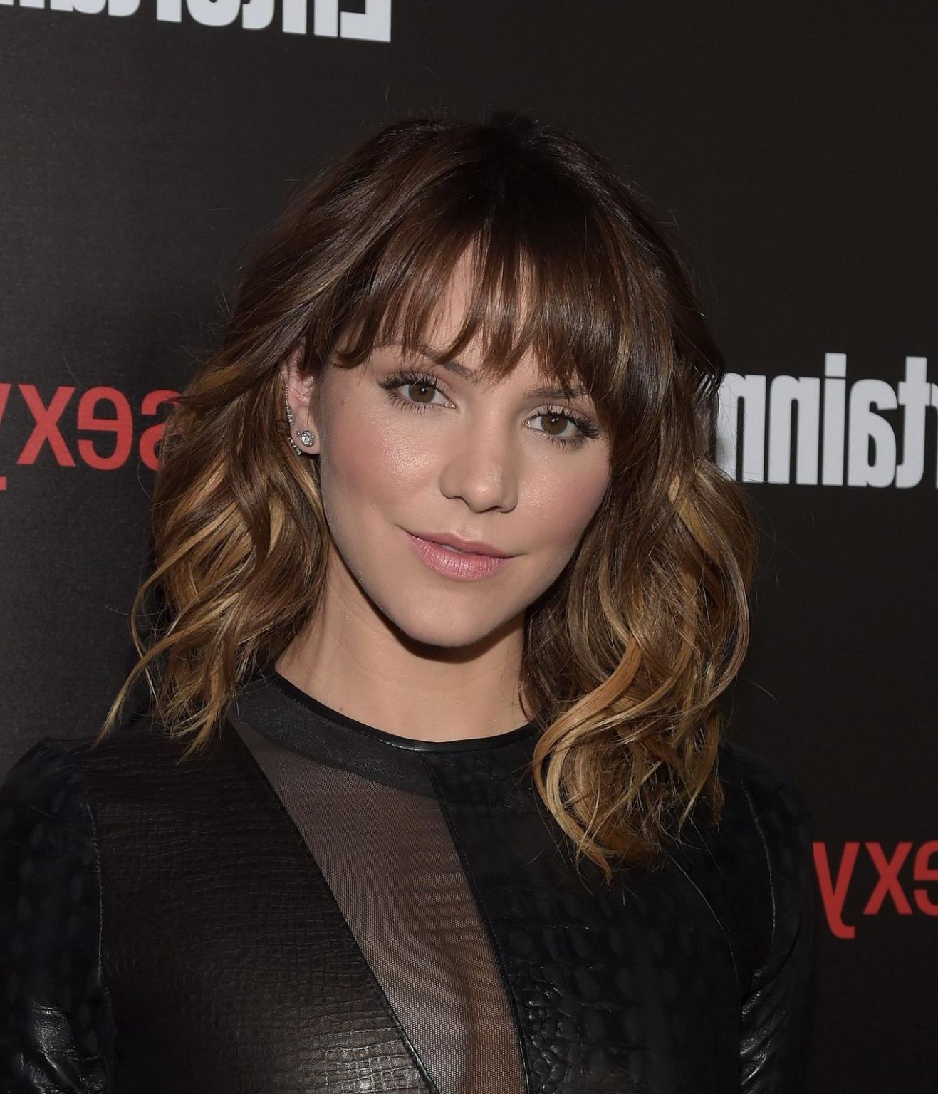 16P Katharine McPhee shows cleavage wearing a black leather dress at EWs Celebration