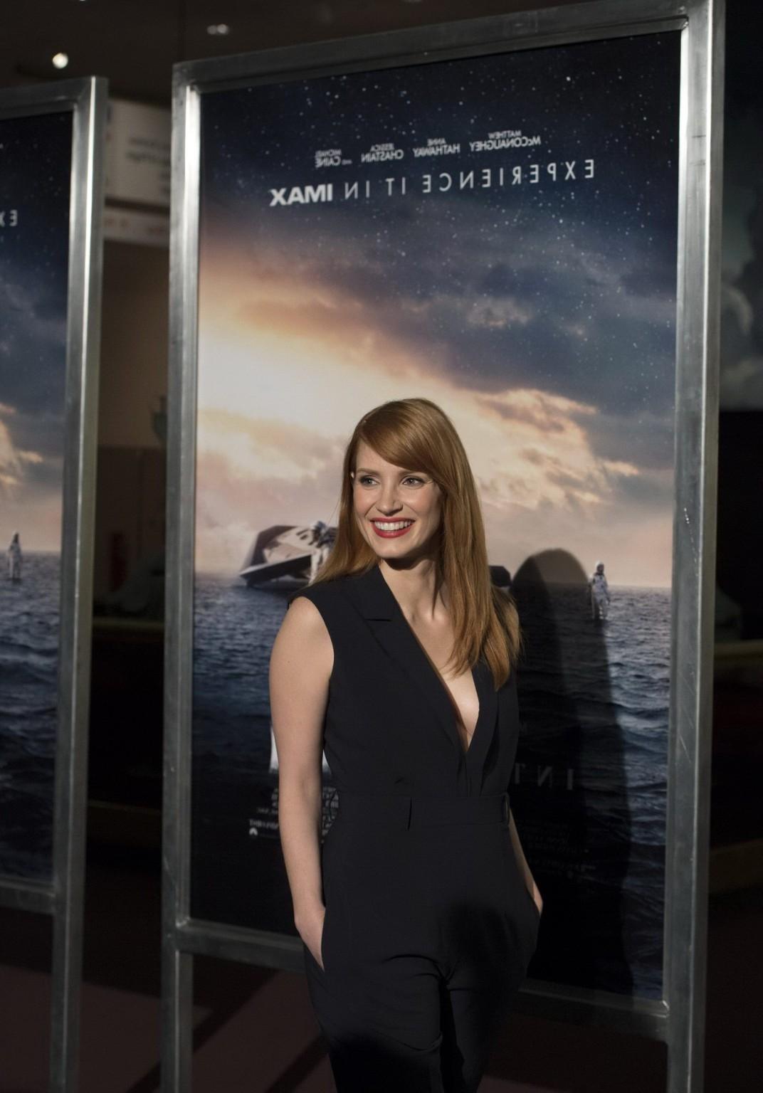 16P Jessica Chastain shows huge cleavage wearing a black jumpsuit at Interstellar pr
