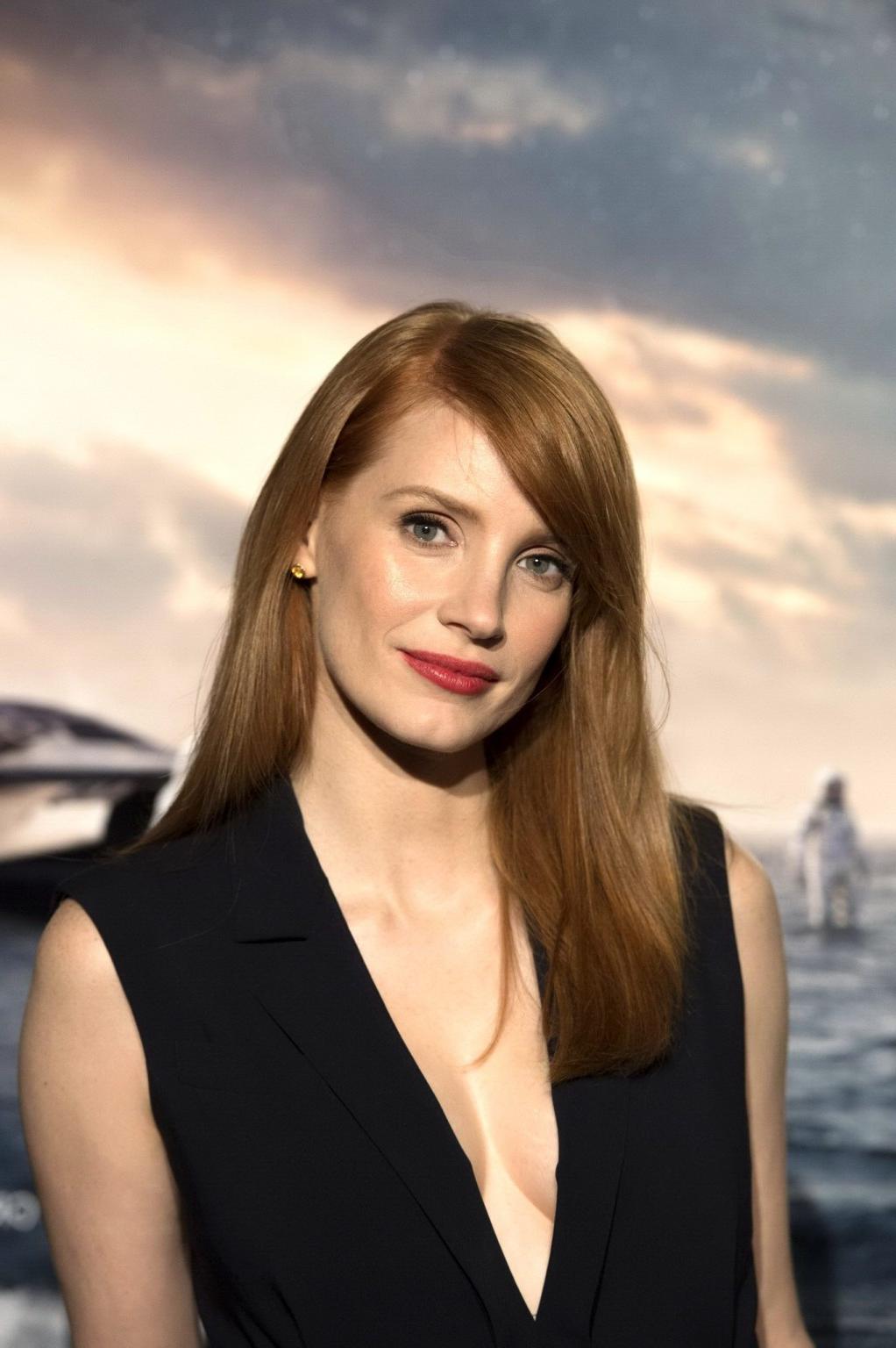 16P Jessica Chastain shows huge cleavage wearing a black jumpsuit at Interstellar pr