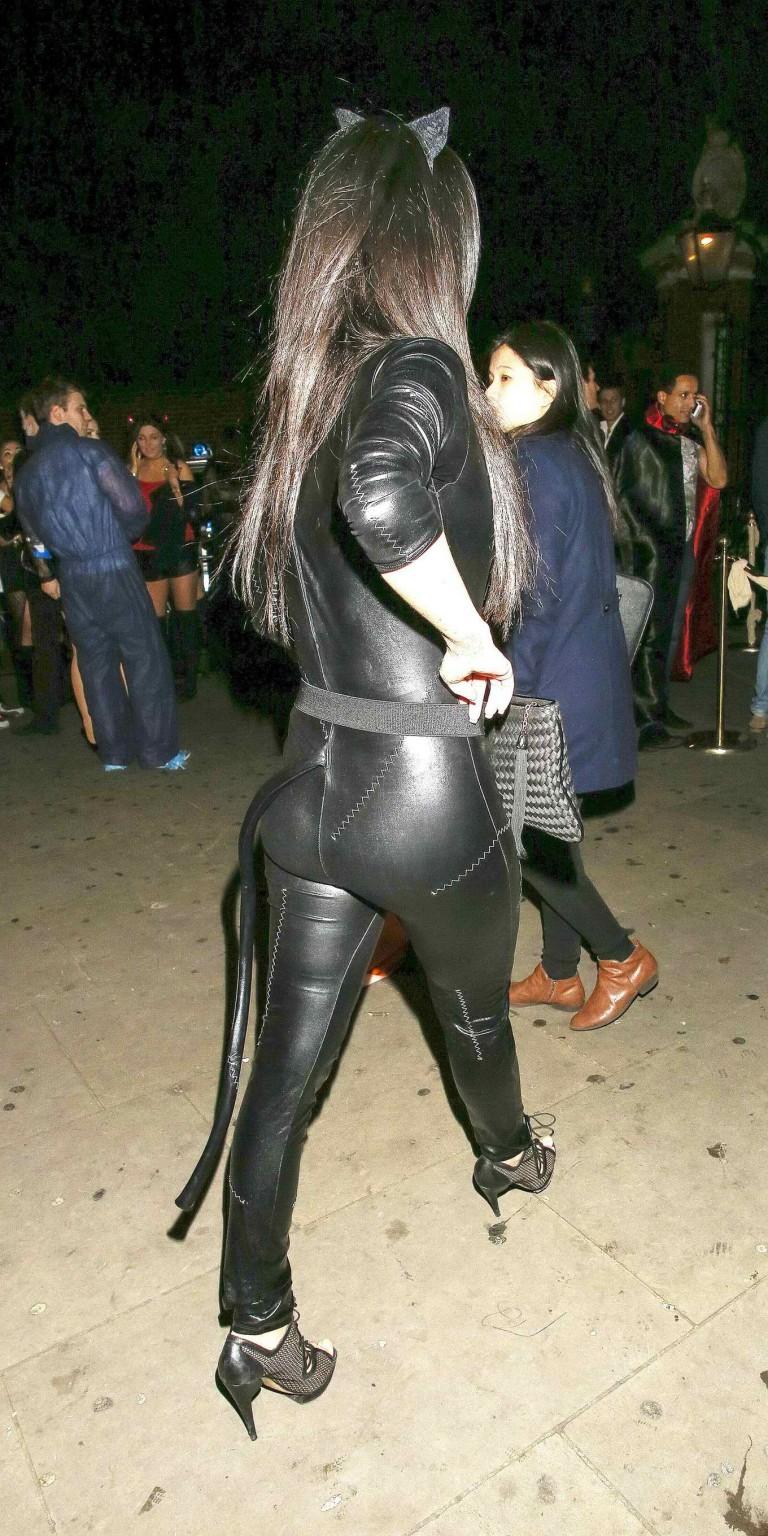 10P Tulisa Contostavlos shows off her ass  cleavage wearing a leather Catwoman costu