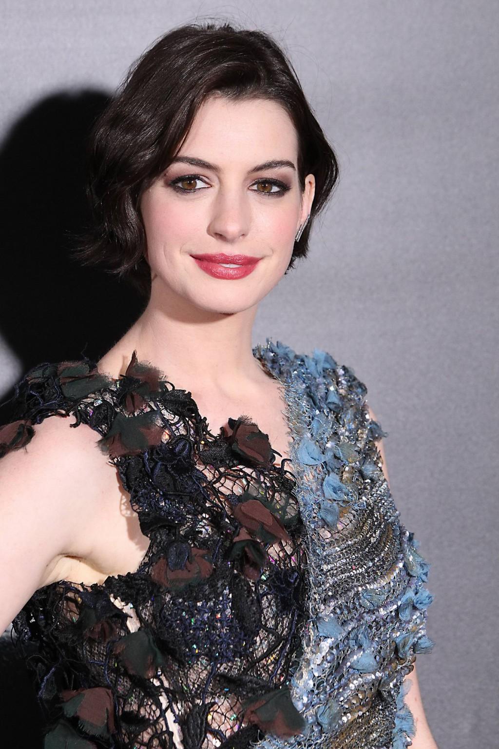 16P Anne Hathaway wearing seethru lace mini dress at the Interstellar premiere in NY