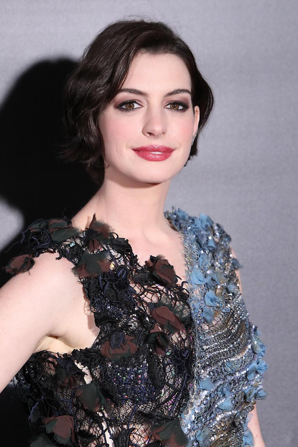 16P Anne Hathaway wearing seethru lace mini dress at the Interstellar premiere in NY