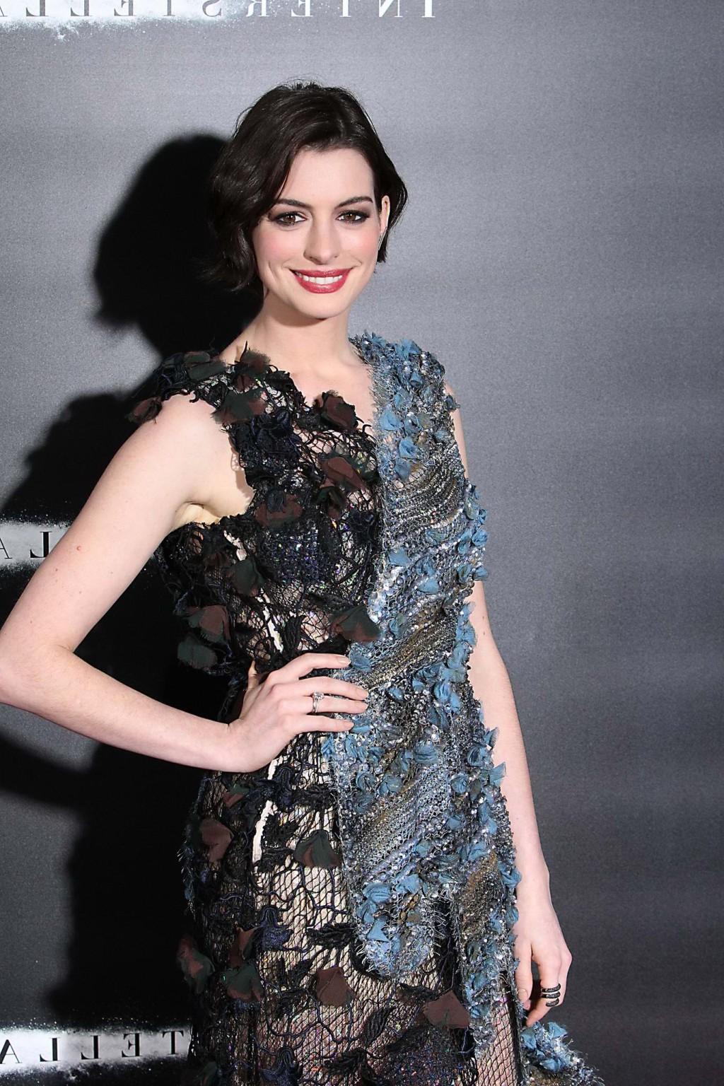 16P Anne Hathaway wearing seethru lace mini dress at the Interstellar premiere in NY