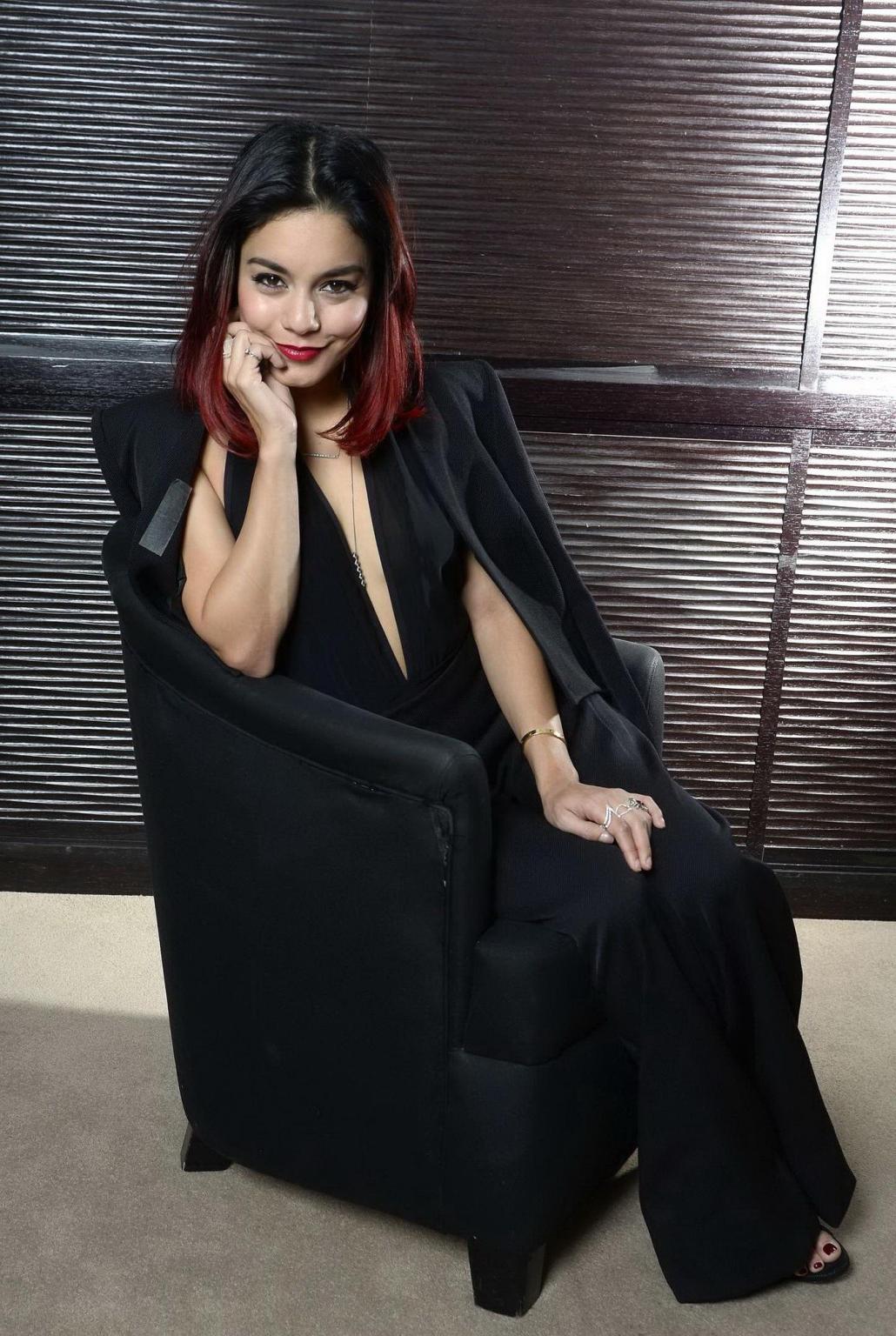 16P Vanessa Hudgens braless showing big cleavage at the Gimme Shelter photocall in P