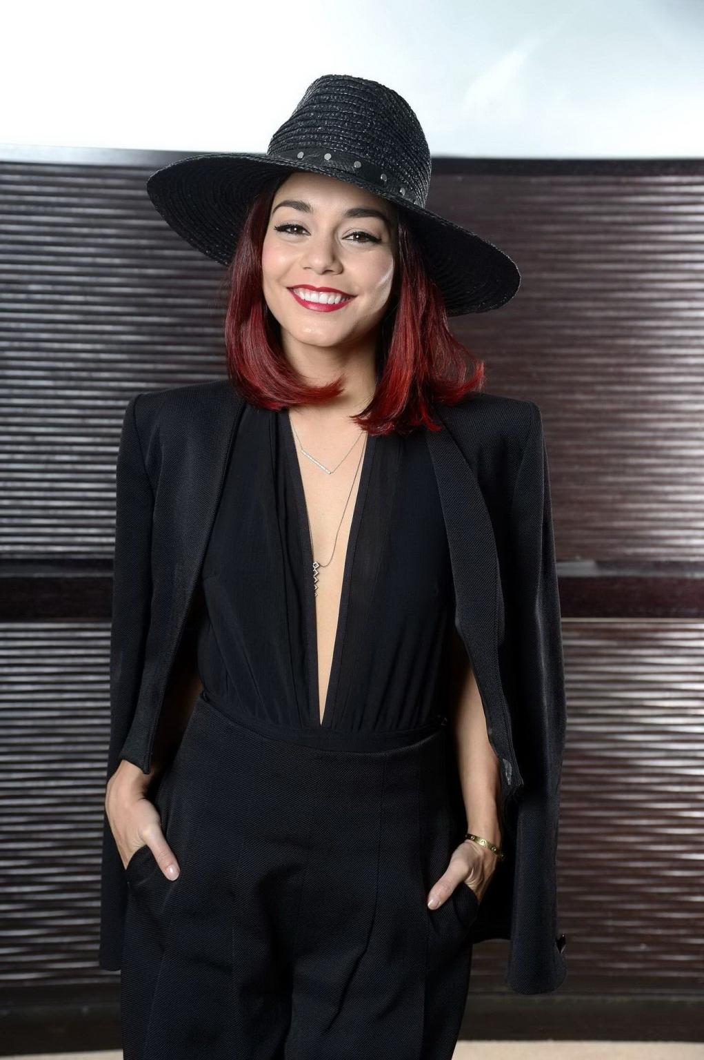 16P Vanessa Hudgens braless showing big cleavage at the Gimme Shelter photocall in P