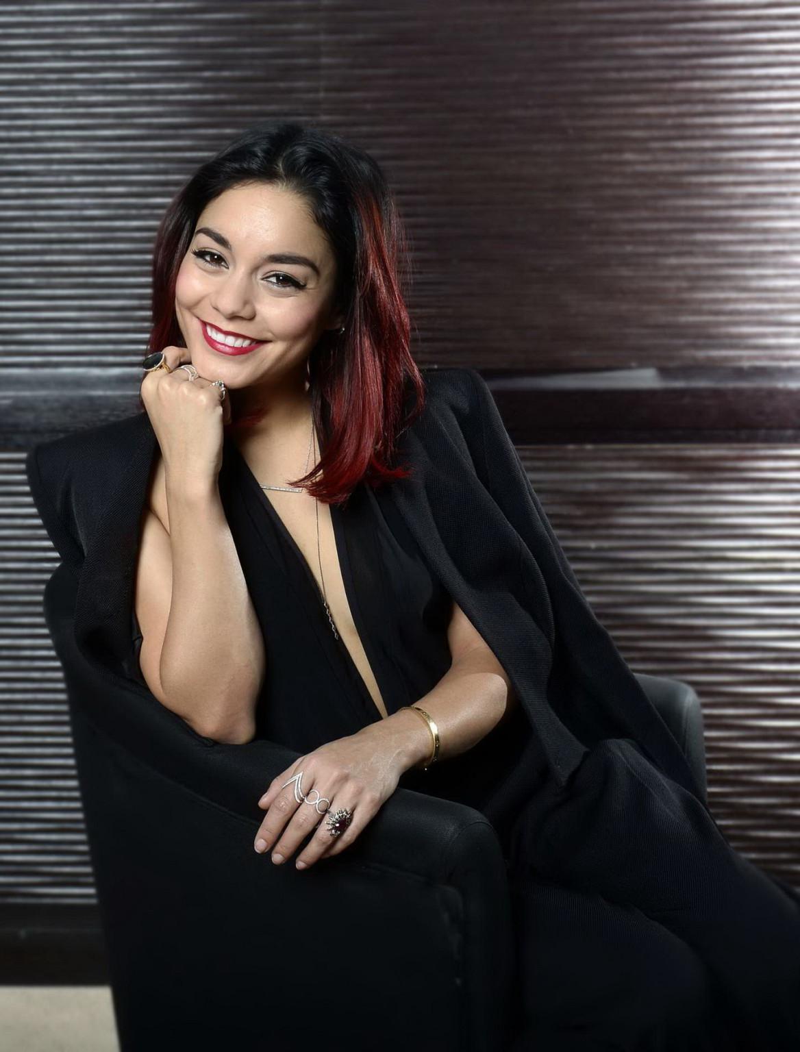 16P Vanessa Hudgens braless showing big cleavage at the Gimme Shelter photocall in P