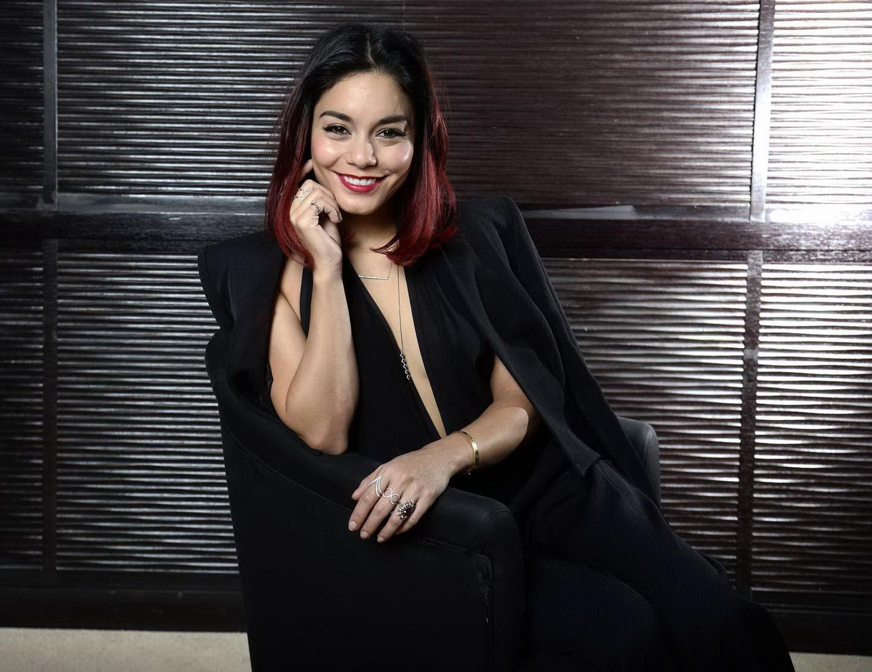 16P Vanessa Hudgens braless showing big cleavage at the Gimme Shelter photocall in P