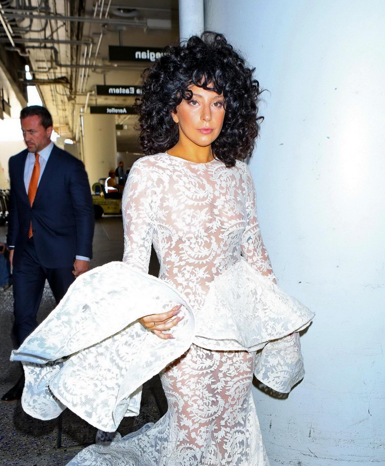 15P Lady Gaga shows off her boobs and ass wearing a see through lace dress at LAX Ai